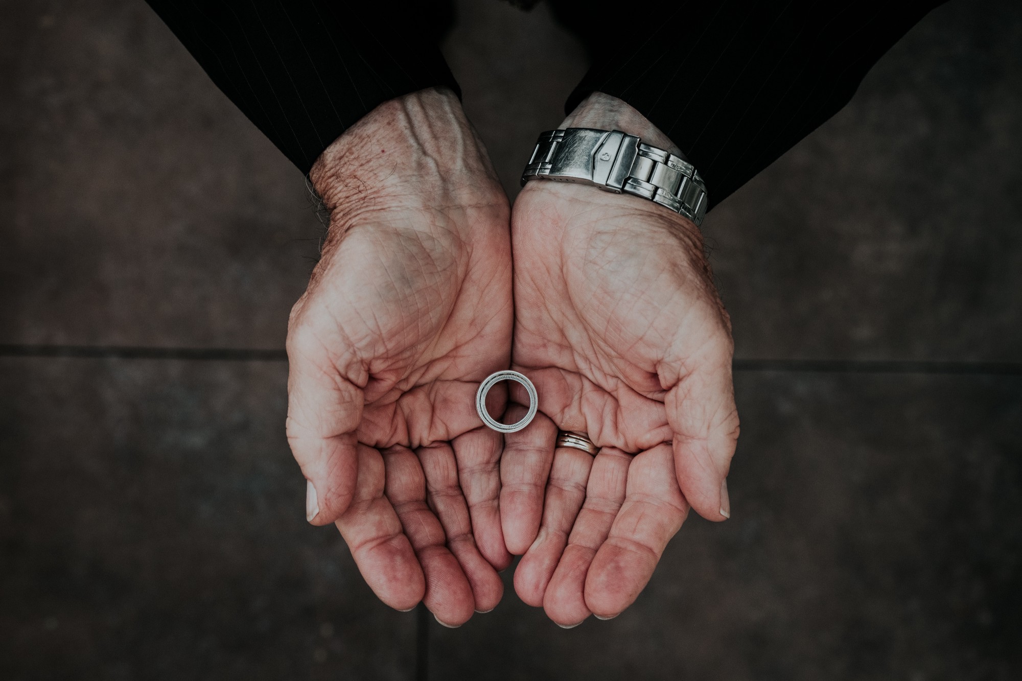 I shot this at a recent Fort Co. wedding, and I use it here with the newlywedsâ permission. Their grandfather made these wedding bands, by hand, with no prior knowledge of ring-making. He told me it was all a labor of love.